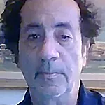 Ron Netsu, age 74, showing his hands and fingers moving freely after taking Joint Genesis.